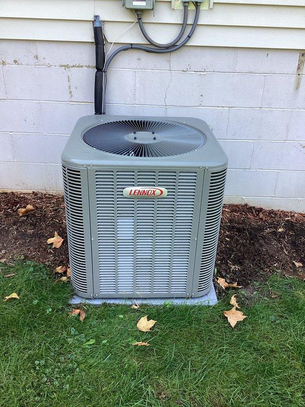 Reclaimed refrigerant from Lennox condenser unit, disconnected refrigerant lines and electrical connections ahead of customer's concrete slab installation. Secured electrical wiring and conduit at disconnect box, then temporarily relocated condenser behind garage. Will return to reconnect complete system after construction is completed.