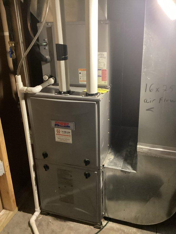 Performed routine maintenance on 8-year-old furnace as part of annual agreement service. Inspection revealed two rusted spots on heat exchanger, a common failure point for this furnace model. Advised homeowner of findings and recommended immediate replacement of heat exchanger. Currently verifying warranty status and parts availability for this 2017 unit before scheduling repair service.