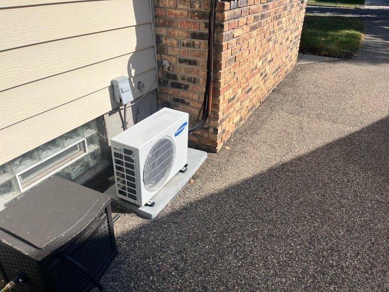 Responded to no cooling complaint for aging Samsung mini split system. Diagnostic testing revealed complete power loss to the unit, which was also noted to be extremely dirty. Scheduled follow-up appointments for both an electrician to inspect the electrical box and a "TGL" service for Tuesday to address the system's condition.