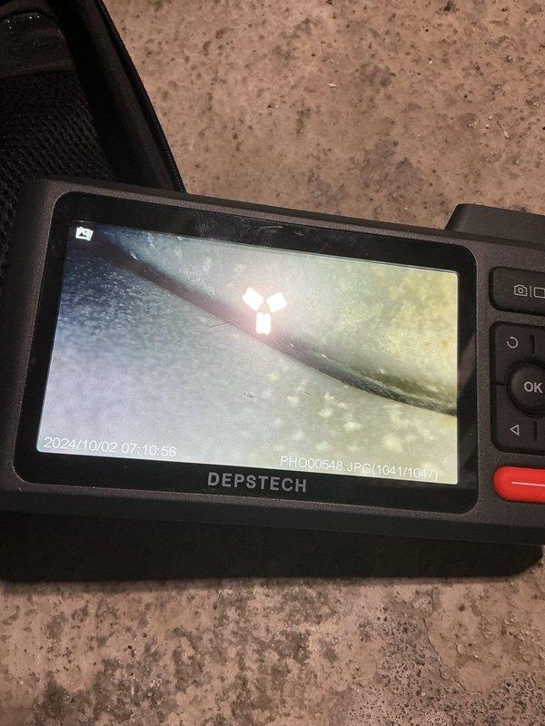 Performed comprehensive tune-up on 10-year-old furnace system. Inspected interior components including Honeywell control module and electrical connections, noting some normal wear and minor corrosion. Conducted thorough inspection of ductwork using DEPSTECH camera, confirming presence of significant dust accumulation requiring professional cleaning service.