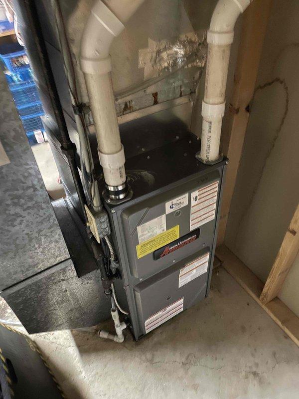 Performed routine furnace preventative maintenance on aging 15+ year old system. Inspection revealed rusty heat exchanger and oil leakage from inducer motor, though unit currently operating within specifications. Enrolled customer in Frequent Rider program for ongoing monitoring of deteriorating components to extend equipment lifespan.