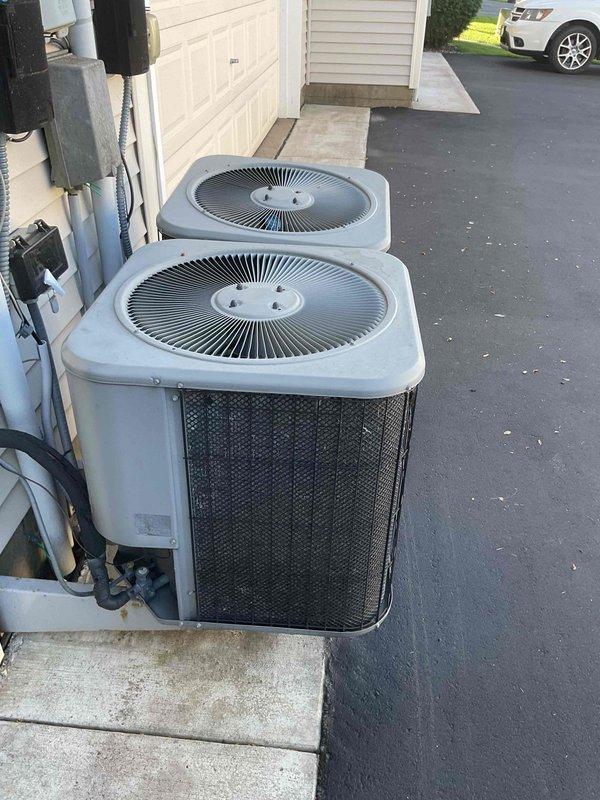 Performed AC tune-up on Lennox system and discovered two significant issues: refrigerant leak with low R22 levels and a cracked heat exchanger with missing igniter. Recommended full system replacement due to age of equipment and safety concerns with the compromised heat exchanger.
