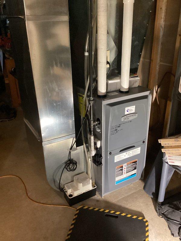 Performed scheduled furnace tune-up, replacing customer-supplied dirty filter and verifying all electrical components were within specification. Inspected heat exchanger and identified areas of concern along back bends and main burner inlets that should be monitored, though no holes or cracks were found. Unit demonstrated proper operation with satisfactory 50°F temperature rise during 15-minute testing period.