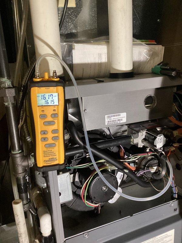 Performed scheduled furnace tune-up, replacing customer-supplied dirty filter and verifying all electrical components were within specification. Inspected heat exchanger and identified areas of concern along back bends and main burner inlets that should be monitored, though no holes or cracks were found. Unit demonstrated proper operation with satisfactory 50°F temperature rise during 15-minute testing period.