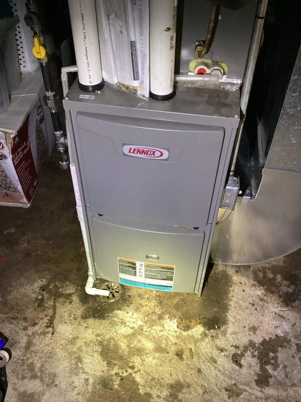 Responded to no-cool call on 2-3 year old Lennox HVAC system in rental property. Diagnosed failed low voltage transformer in furnace that had caused complete system failure, likely related to partially clogged AC condensate drain line that had been leaking into the furnace. Replaced transformer, cleared blocked drain line to ensure proper drainage, and verified all system functions were restored to normal operation.