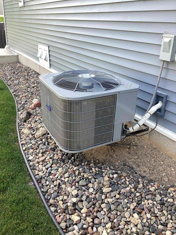 Responded to no-cool complaint for 7-8 year old AC system with tripped breaker. Diagnostic testing revealed a drained capacitor on fan side while compressor tested good. Replaced defective capacitor, reset breaker, and verified proper system operation by checking refrigerant levels, wiring, and coil. System restored to normal cooling function.