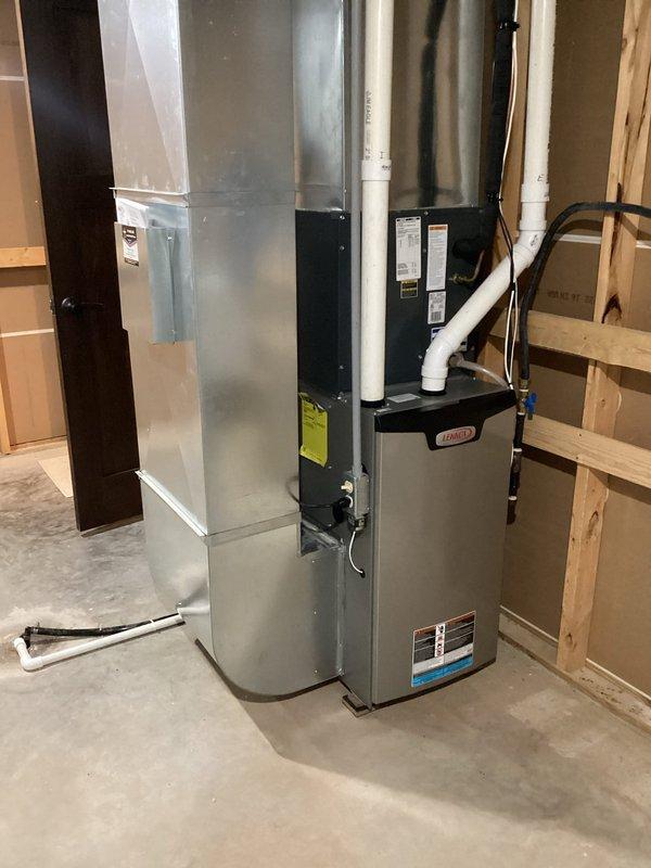 Performed annual Family Rewards furnace tune-up on 3-year-old Lennox system. Conducted comprehensive inspection including electrical components, heat exchanger, gas pressure verification, and blower assembly - all functioning within specifications. System demonstrated proper 50-degree temperature rise during 20-minute operational test with no issues identified.