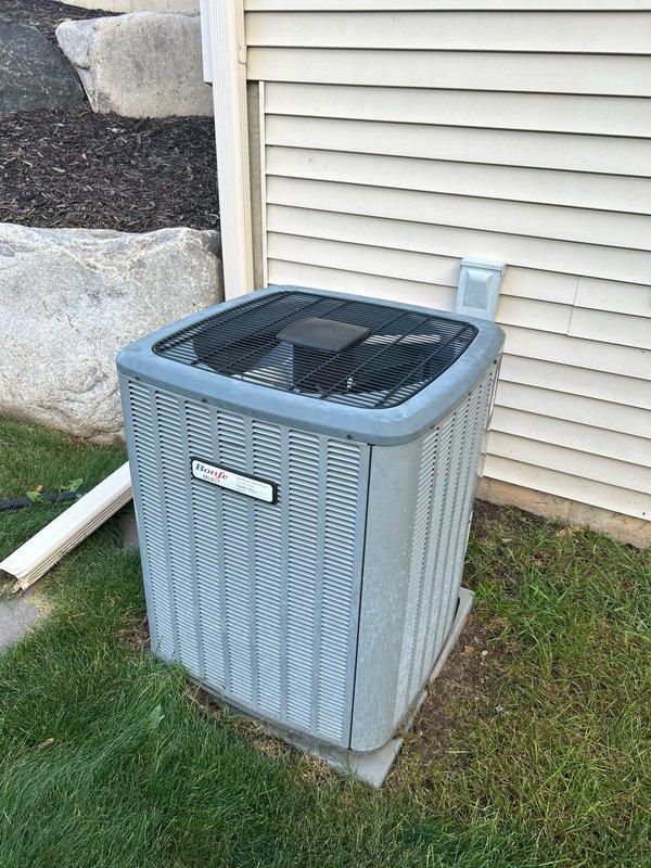 Performed complimentary tune-up inspection on an 8-year-old Goodman AC system at customer's request. Unit is currently functioning properly with approximately 7-12 years of expected remaining service life based on industry standards. Advised customer that while AC replacement isn't immediately necessary, replacing both furnace and AC simultaneously would be optimal to prevent potential water damage and maximize efficiency benefits.