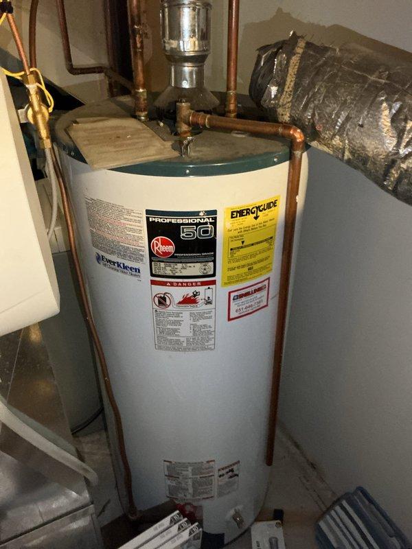 Inspected shower valve and identified defective cartridge causing handle issues. Provided customer with repair options including valve replacement and new water heater installation. Customer elected to attempt cartridge replacement independently. Also evaluated existing water heater system and exterior spigots, noting proper pipe connections but signs of aging on copper lines.