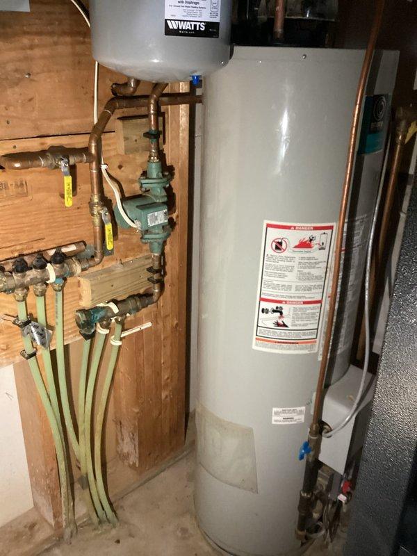 Diagnosed and repaired geothermal unit experiencing operational failure due to non-functioning pumps. Found defective control board with damaged fuse holder, installed breaker switch as solution, replenished loop water, and verified system operation. Secondary inspection of gas furnace confirmed both heating systems functioning properly, though noted floor heat water heater requires separate service.