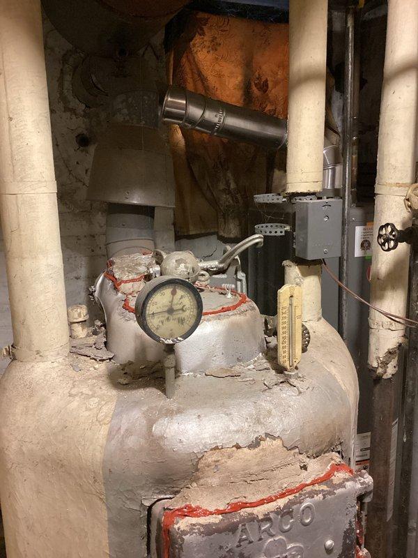 Responded to warranty service call regarding an improperly secured condenser unit installed in December. Upon inspection, confirmed wall bracket anchors had released, causing the unit to become unstable and at risk of falling from its wall-mounted position. Completed installation correction form and documented need for install crew to return with proper mounting hardware to secure the condenser safely to the building.