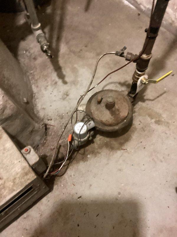 Responded to warranty service call regarding an improperly secured condenser unit installed in December. Upon inspection, confirmed wall bracket anchors had released, causing the unit to become unstable and at risk of falling from its wall-mounted position. Completed installation correction form and documented need for install crew to return with proper mounting hardware to secure the condenser safely to the building.