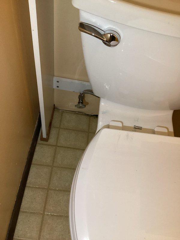 Responded to service call regarding shut-off valve leakage at toilet. Upon inspection, determined leaking was occurring at the packing nut of the shut-off valve. Replaced the faulty shut-off valve to resolve the issue.
