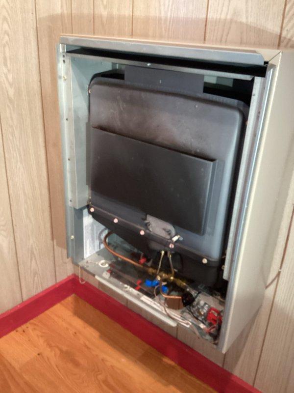Responded to service call for heater pilot light issues in an outbuilding. Found gas supply had been shut off; restored gas flow, relit pilot light, and verified proper operation of wall-mounted heating unit. Recommended customer maintain pilot light year-round to prevent future ignition problems.