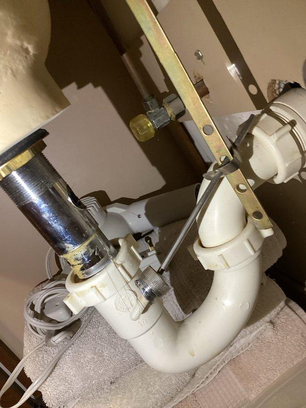 Resolved multiple leak issues by replacing broken lab drain assembly under bathroom vanity, installed new half-inch gate valve to address leaking packing on outdoor hose bib valve, and cleared calcium deposits from toilet to restore proper flushing. Additionally installed customer-supplied showerhead as requested.