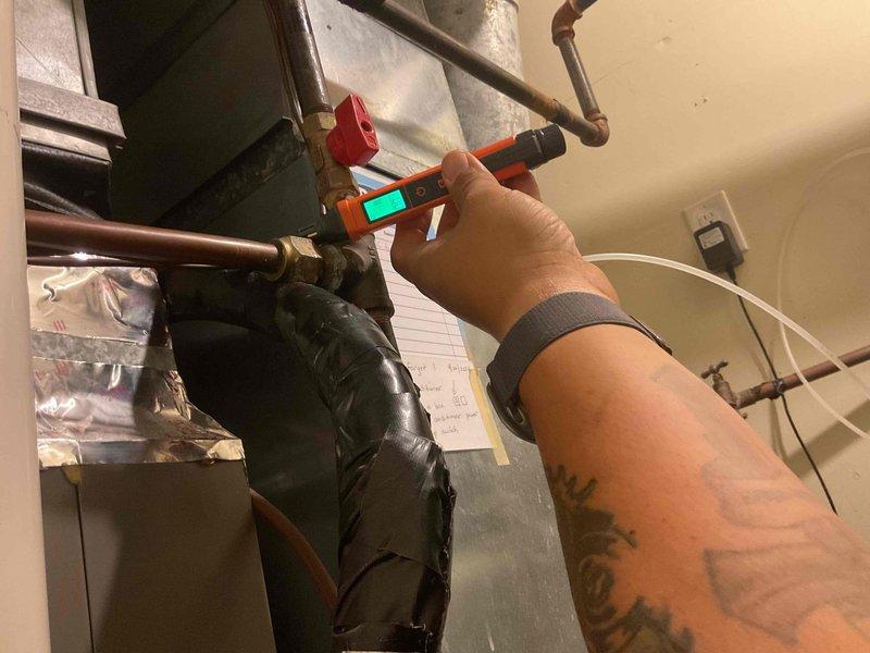 Conducted annual furnace tune-up on 8-year-old unit, replacing dirty filter with new one. Inspection included verification of proper system connections and temperature readings at critical junction points. Visual assessment confirmed all components functioning normally after service.