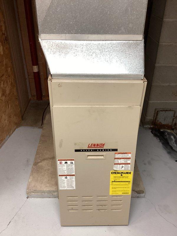 Performed scheduled oil furnace tune-up on 10-2 oil furnace per maintenance agreement. Discovered incorrect nozzle size (.75 installed when .65 was required per burner specifications) and soot buildup in pipes and inspection hall. Replaced with correct nozzle size, vacuumed chambers, inspected heat exchanger, and adjusted air-fuel mixture. Unit is now operating efficiently with proper combustion.