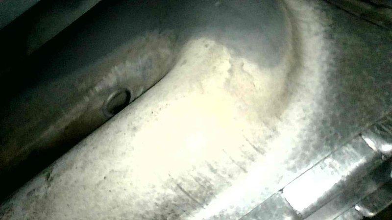 Completed furnace tune-up on 17-year-old FRP unit. Replaced customer-supplied filter, verified clean blower within specifications, and checked electrical components. Noted inducer motor drawing excessive amperage (4A vs. 0.24A specification) and observed concerning areas on heat exchanger, though no visible cracks were found. System initially cycled off without error codes but performed normally during extended testing with proper 45° temperature rise. Customer informed about inducer performance concerns, heat exchanger condition, and benefits of maintenance agreement.