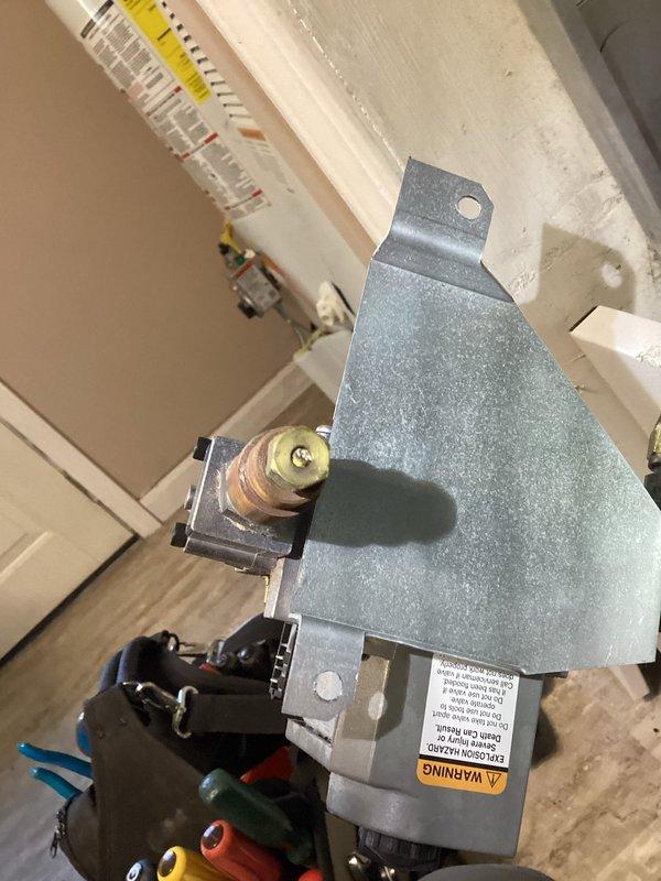 Responded to complaint of insufficient heating due to weak flame signal. Diagnosed restriction in gas flow caused by spider web in orifice within burner assembly. Performed cleaning of affected components, verified proper gas pressure, and confirmed intake/exhaust were unobstructed. System now operating with normal flame and proper heating function.