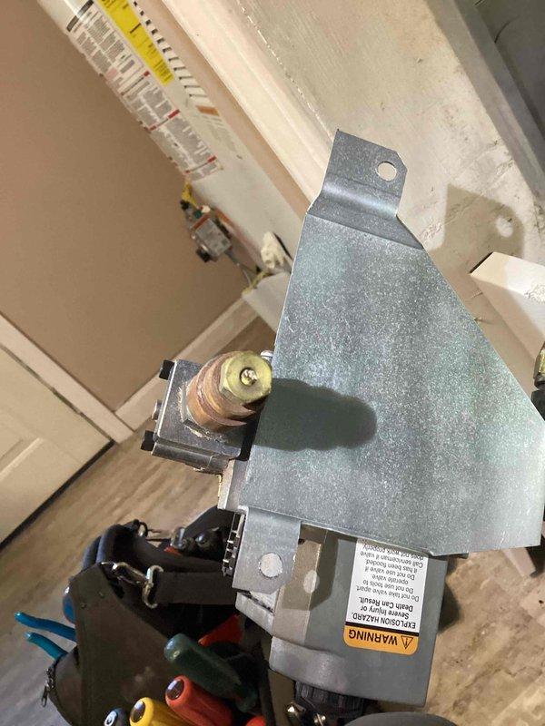 Responded to complaint of insufficient heating due to weak flame signal. Diagnosed restriction in gas flow caused by spider web in orifice within burner assembly. Performed cleaning of affected components, verified proper gas pressure, and confirmed intake/exhaust were unobstructed. System now operating with normal flame and proper heating function.