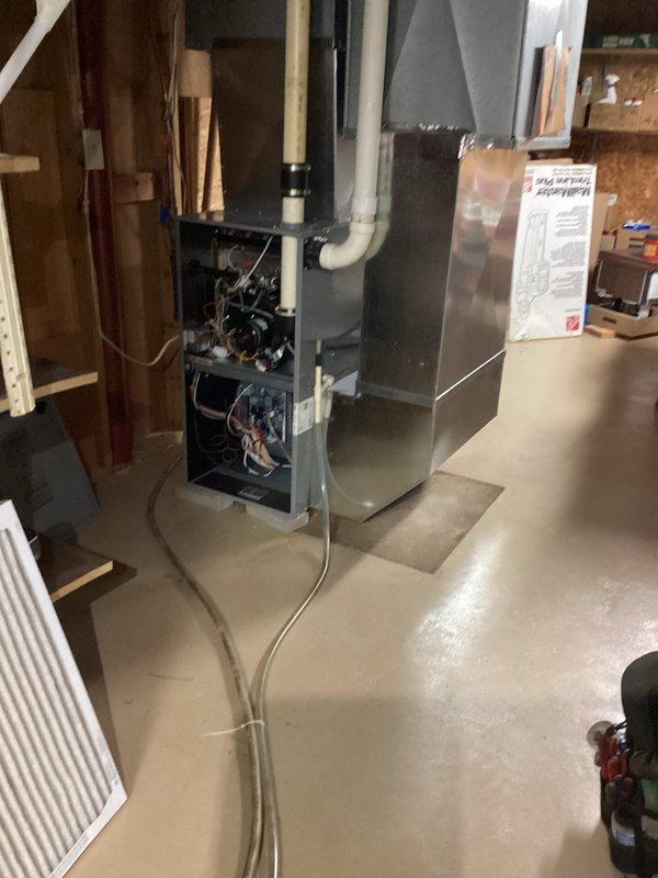 Performed scheduled furnace maintenance on 3-year-old Goodman heating system under Rewards membership agreement. Completed comprehensive tune-up including heat exchanger inspection, flame sensor cleaning, air filter replacement, and operational verification. All systems functioning properly with no defects identified.