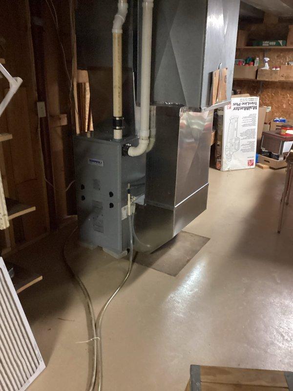 Performed scheduled furnace maintenance on 3-year-old Goodman heating system under Rewards membership agreement. Completed comprehensive tune-up including heat exchanger inspection, flame sensor cleaning, air filter replacement, and operational verification. All systems functioning properly with no defects identified.