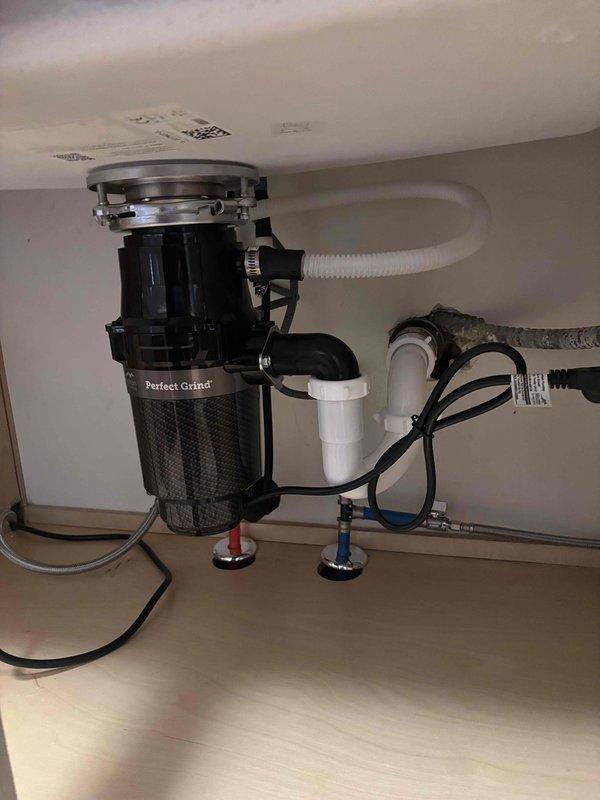Successfully installed a new "Perfect Grind" garbage disposal unit under the kitchen sink, properly connecting it to existing PVC drainage pipes and ensuring all plumbing connections were secure and leak-free. Client was also provided a quote for shower valve replacement as requested.