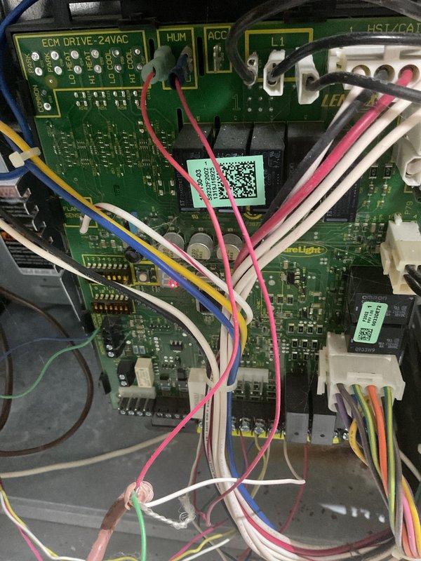 Performed scheduled furnace tune-up on 12-year-old FRP unit for Family Rewards member. Identified faulty gas valve and dirty filter; completed maintenance by replacing gas valve and documenting with photos of control board and condensate drainage system components.