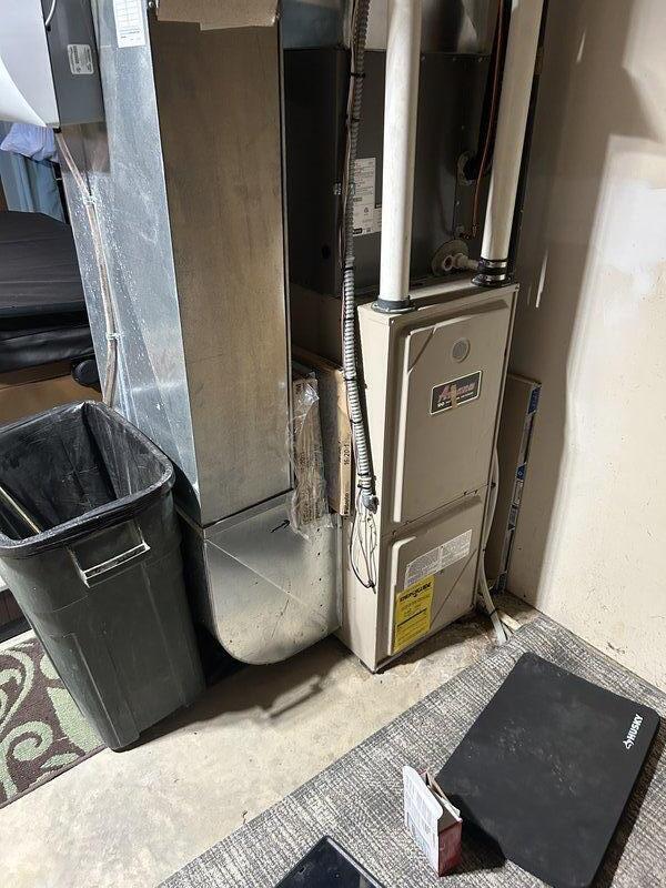 Diagnosed no heat issue on 10+ year old furnace with recent inducer replacement. Determined thermostat communication failure was causing system non-operation. Applied manual pressure to thermostat which temporarily restored function. Replaced aging thermostat with new T4 model to permanently resolve communication issues. Verified proper system operation after installation.