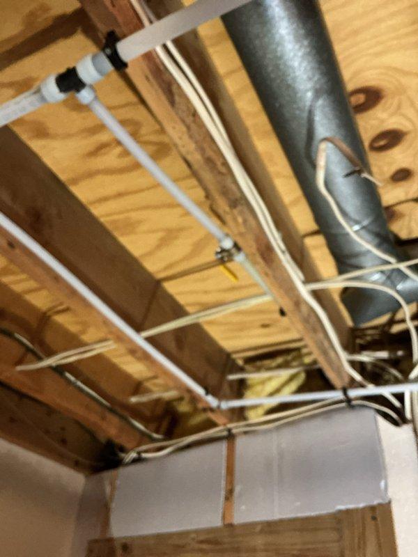 Investigated low water pressure issue affecting multiple areas of residence with no water supply to garage shop. Discovered closed ball valve preventing water flow to the garage shop area. Restored service by opening the ball valve and adjusted pressure switch settings from 60 PSI to 70 PSI to improve overall system pressure throughout the property.