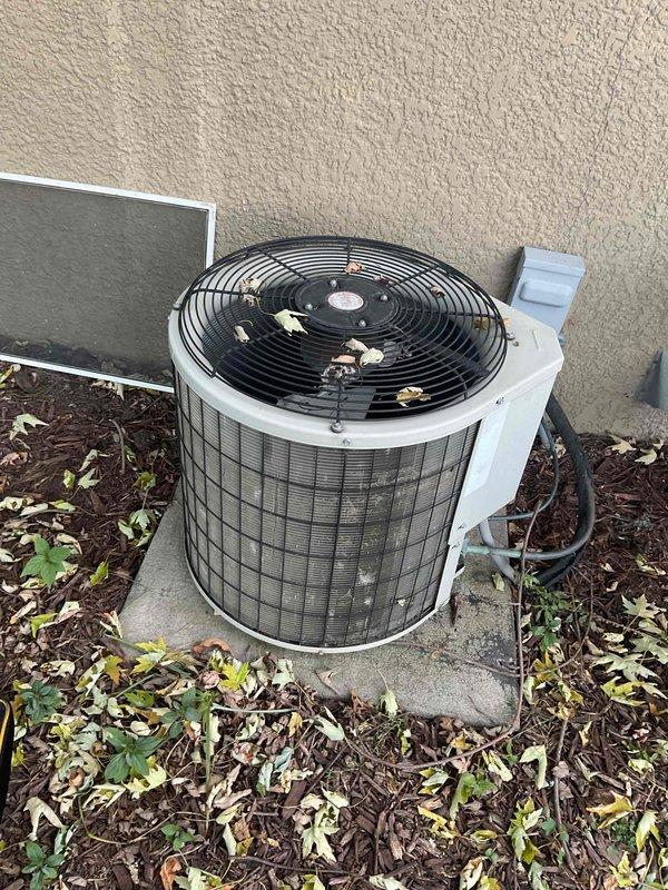 Responded to service call for AC system over 10 years old with no cooling function. Diagnostic inspection revealed failed capacitor, worn contactor, and deteriorated condenser motor. Replaced all defective components to restore system operation.