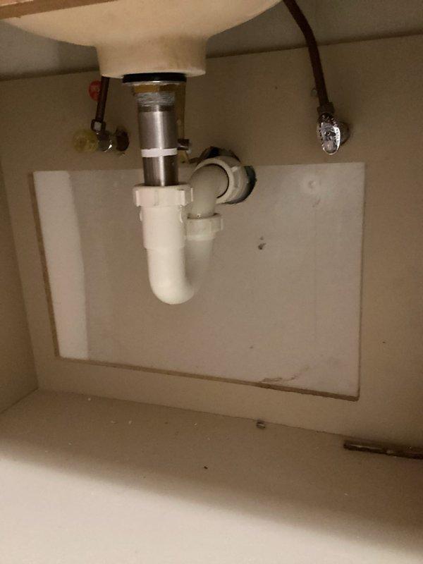 Replaced and installed chrome pop-up drain assembly in downstairs bathroom lavatory. Verified proper function of the new drain mechanism and confirmed no leaks in the connection to the P-trap. Customer also mentioned concern about an exterior hose bibb leak that will require future service.