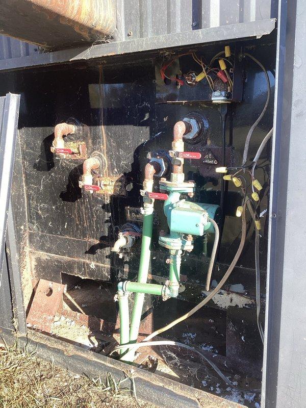 Performed comprehensive tune-up on 20-year-old backup furnace system. Inspected and cleaned components, noting clean filter and blower but observed motor showing initial hesitation at startup. Identified clogging in secondary heat exchanger, but confirmed heat exchanger integrity with no compromises found. Verified proper gas pressures with 55°F temperature rise during 20-minute operational test. Also inspected supplementary wood boiler system, confirming all components functioning correctly.