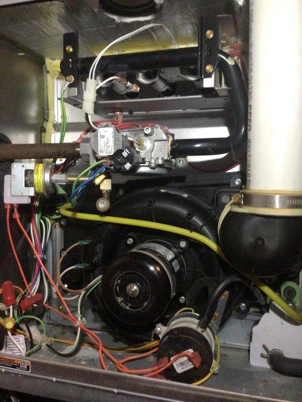 Performed scheduled maintenance on 8-year-old ICP model FG9MXE furnace. Completed comprehensive tune-up including flame sensor cleaning, electrical testing (all components within specifications), and heat exchanger inspection with no compromises detected. Verified drain lines clear and system functioning properly.