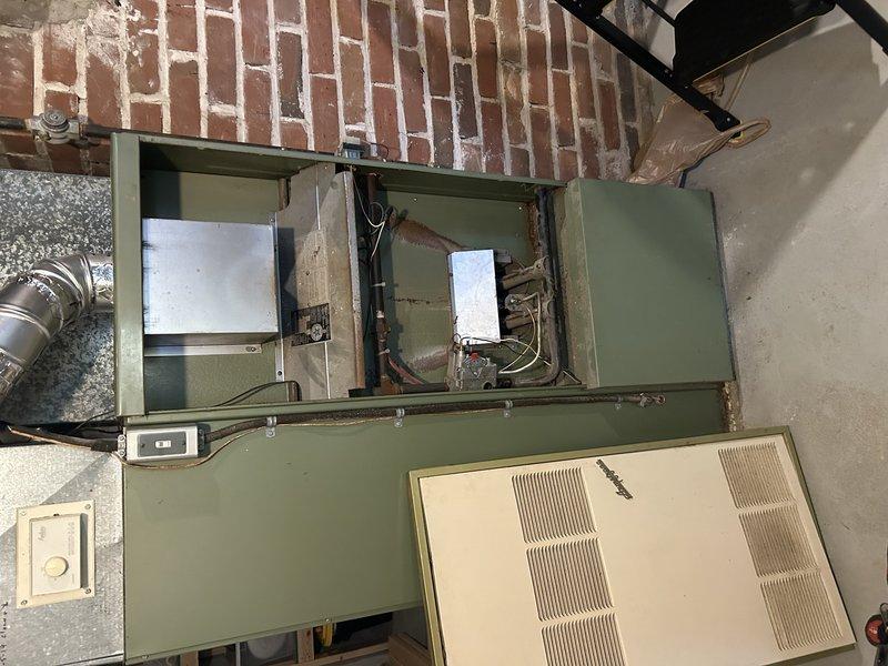 Diagnosed 30+ year old furnace with no heat due to faulty thermocouple and leaking pilot assembly. Determined complete pilot assembly replacement is required to restore operation. Advised customer about system inefficiency with approximately 30% heat loss through chimney due to unit age, and placed parts order for new assembly.
