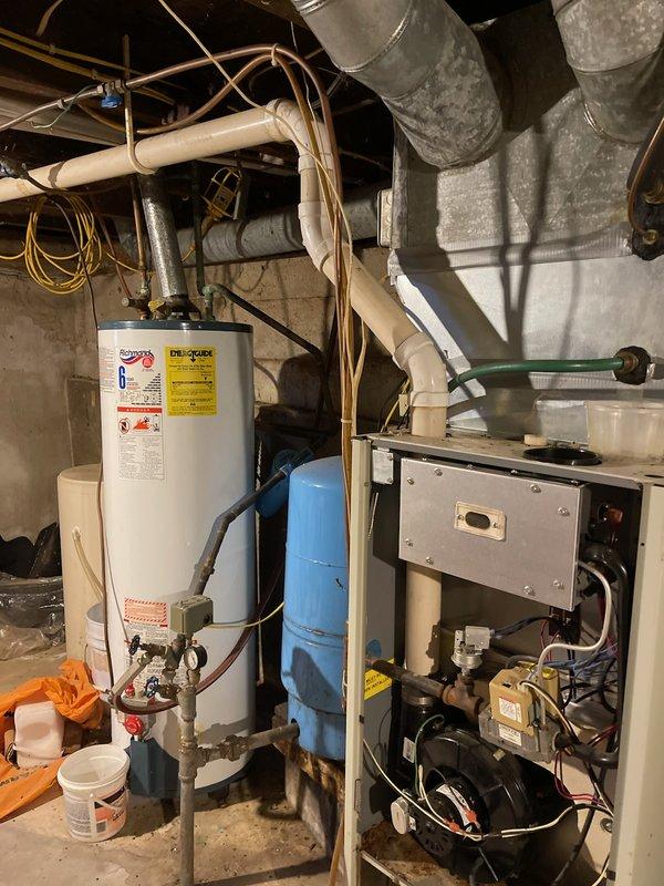 Responded to no heat call for LP-fueled furnace. Diagnosed multiple system failures including stuck gas valve preventing fuel flow to burners and out-of-specification capacitors for both blower motor and inducer. Scheduled follow-up appointment with advisor to address additional concerns with inducer and blower motor showing damage from capacitor issues.
