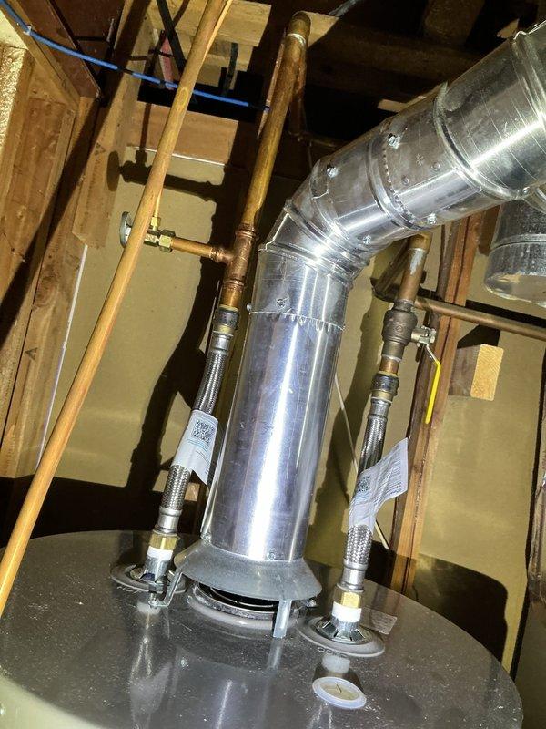 Completed residential service call to address lack of sump pump and code violations. Installed new sump pump system with battery backup to provide flood protection. Also addressed non-compliant water heater issues, bringing it up to current code requirements, and inspected faulty water softener with pressure gauge reading approximately 80 psi.