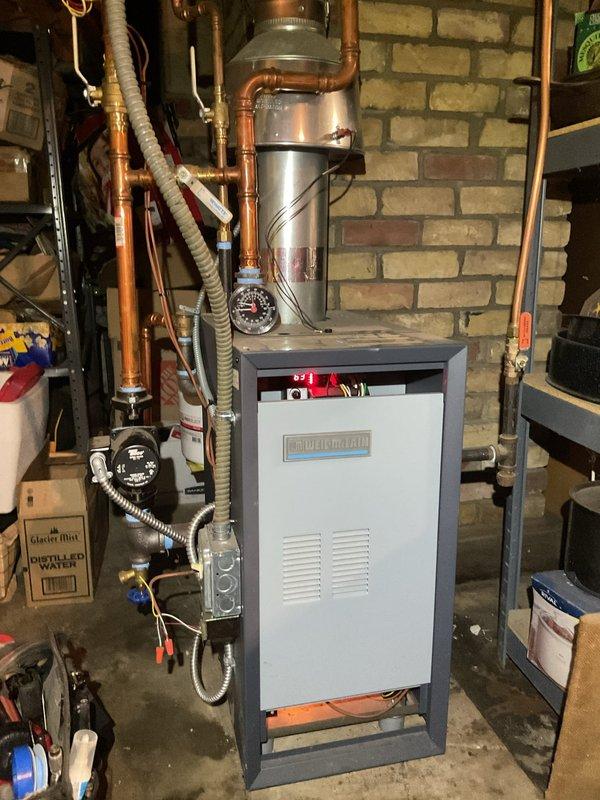 Responded to no-heat call for boiler system with pilot light on and diagnostic indicators showing three red lights. Investigation revealed gas valve was shut off following previous tune-up service. Restored proper operation by reopening gas valve and confirming system functionality.