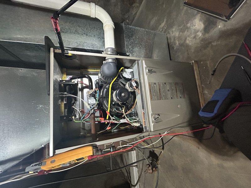 Responded to no-heat call for 2012 Carrier furnace. Diagnosed failed gas valve and identified cracks in both collector box and heat exchanger. Cleaned flame sensor and discussed replacement options with homeowner. Service advisor scheduled for furnace and AC replacement estimate.