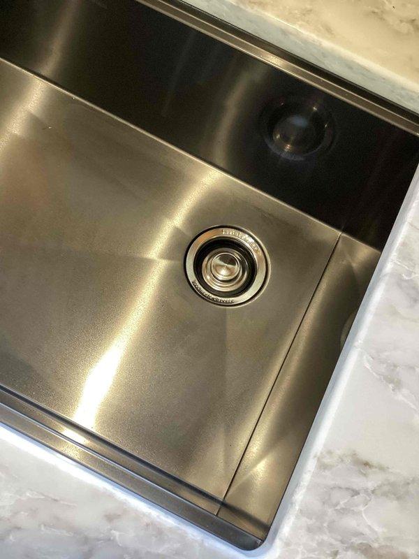 Successfully installed customer-supplied kitchen faucet, connecting to existing plumbing system. Completed setup of customer-provided under-sink reverse osmosis water filtration system and connected it to the kitchen faucet. Additional work included replacement of existing garbage disposal with customer-supplied unit, utilizing the existing electrical and plumbing connections.