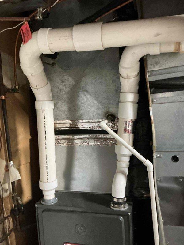 Replaced induced draft motor on 14-year-old furnace as per scheduled repair. Inspection using NT550 endoscope revealed multiple heat exchanger tube failures with visible corrosion and elevated carbon monoxide levels during combustion analysis, rendering unit unsafe to operate. Homeowners opted for service advisor consultation regarding furnace replacement options.