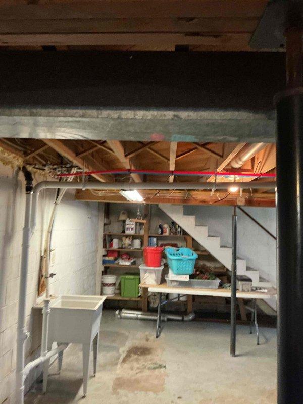 Completed comprehensive plumbing inspection as part of membership service. Identified water softener drain line leak and completed necessary repairs. Further investigation recommended to pinpoint source of secondary leak observed from one of the tanks.