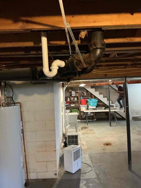 Completed comprehensive plumbing inspection as part of membership service. Identified water softener drain line leak and completed necessary repairs. Further investigation recommended to pinpoint source of secondary leak observed from one of the tanks.