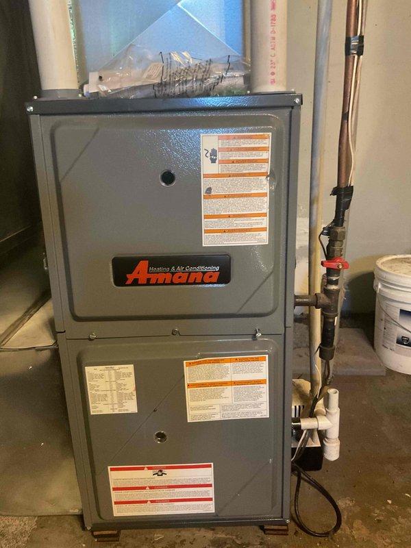 Responded to no heat call for 8-year-old Amana furnace. Diagnostic testing revealed inducer motor functioning properly but no flame ignition. Identified faulty gas valve as root cause of heating failure. Replaced defective gas valve, which restored proper ignition sequence and normal heating operation.