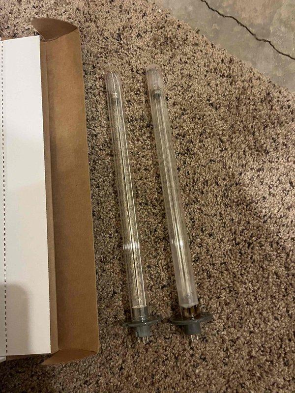 Conducted scheduled furnace tune-up maintenance under the bi-annual service agreement. Performed full inspection with electrical component testing, cleaned flame sensor, and cleared all drainage lines. Replaced UV bulbs in the APCO-X air treatment system as requested, confirming proper operation of the new components. All systems functioning within specifications.