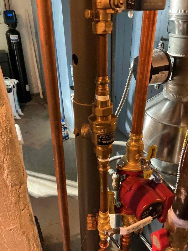Performed diagnostic inspection of a one-year-old boiler system. Confirmed customer had inadvertently overpressurized the system by opening fill valves, causing relief valve activation. Checked relief valve which showed minimal residual dripping, attempted to reseat plunger. Verified proper function of all other system components and provided comprehensive education to homeowner on correct system operation and pressure maintenance procedures.