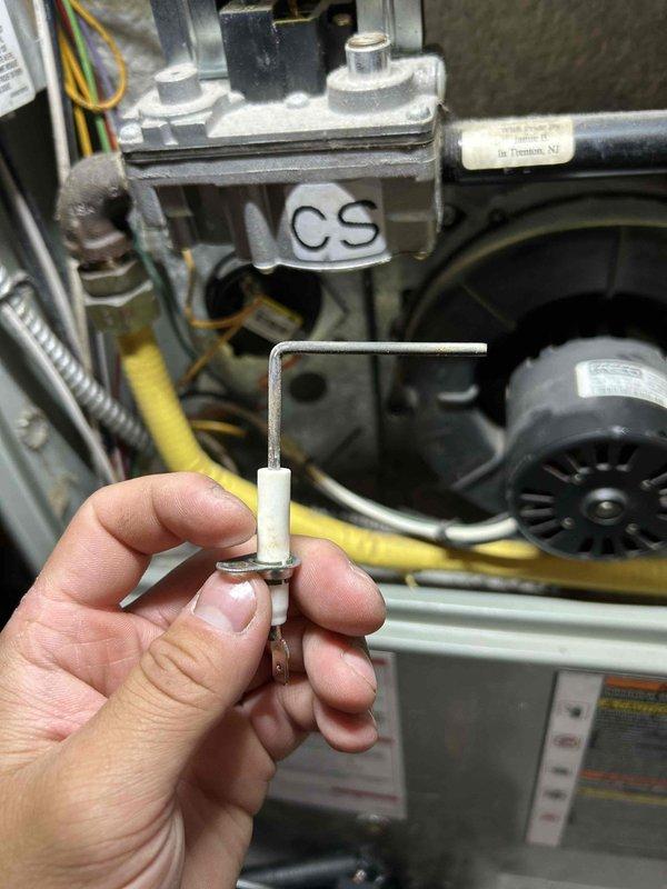 During scheduled furnace tune-up on 22-year-old American Standard FRP system, discovered cracked heat exchanger at crimp location. Carbon monoxide test revealed elevated levels at 16ppm. Documented damage with camera inspection shared with homeowner, completed 911 form due to safety concern, and provided replacement options for heat exchanger or complete system. Gas pressure measured at 3.3 WC with no adjustment needed. Homeowner opted for temporary gas leak protection (TGL) while considering replacement options.