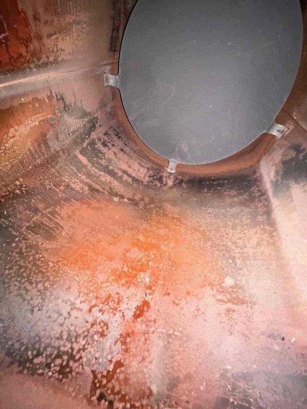 Responded to no-heat call for 20+ year-old furnace that was cycling on without blower operation. Diagnosed failed igniter and observed extensive rust/corrosion in heat exchanger area documented in photos. Replaced igniter, verified proper ignition sequence and restored heat functionality with complete system testing before completion.