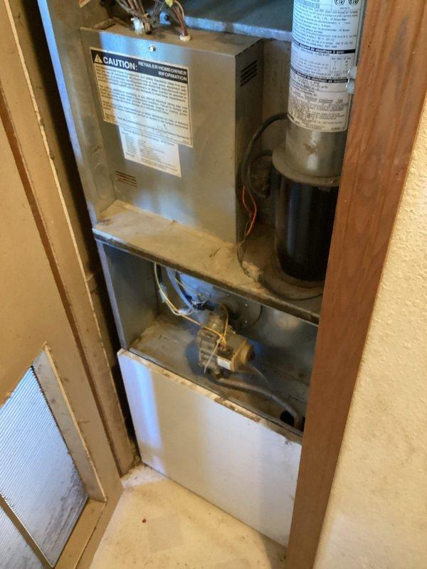 Diagnosed 20+ year old furnace with no heat issue - inspection revealed burned out igniter while heat exchanger remained in good condition. Replaced igniter and verified proper system operation, restoring heating function. Unit now firing correctly with normal operation confirmed during post-repair testing.