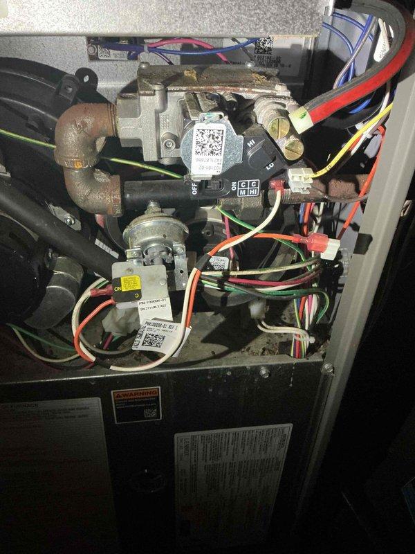 Performed comprehensive seasonal maintenance on 4-year-old furnace and 14-year-old AC unit. All furnace components inspected and found in good working condition including igniter, flame sensor, gas valve, blower assembly, induced draft motor, capacitor, and control board. Combustion analysis confirmed clean and efficient operation. AC electrical components checked with no issues found despite cooler weather limiting full system testing. Client confirmed adequate cooling performance during normal operation.